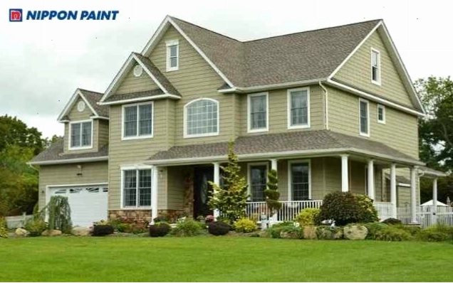Biệt thự tân cổ điển sơn màu xanh lá cây kết hợp mái đỏ và cột trắng thanh lịch